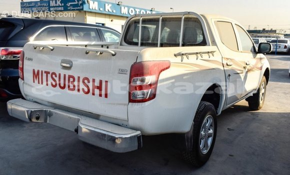 Buy Import Mitsubishi L200 White Car in Import - Dubai in Akmecet Buy Import Mitsubishi L200 White Car in Import - Dubai in Akmecet
