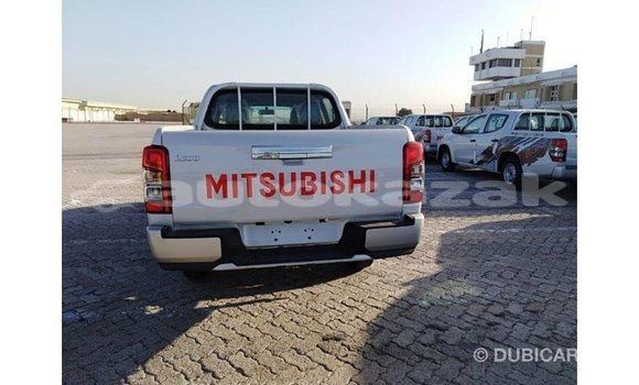 Buy Import Mitsubishi L200 White Car in Import - Dubai in Akmecet Buy Import Mitsubishi L200 White Car in Import - Dubai in Akmecet