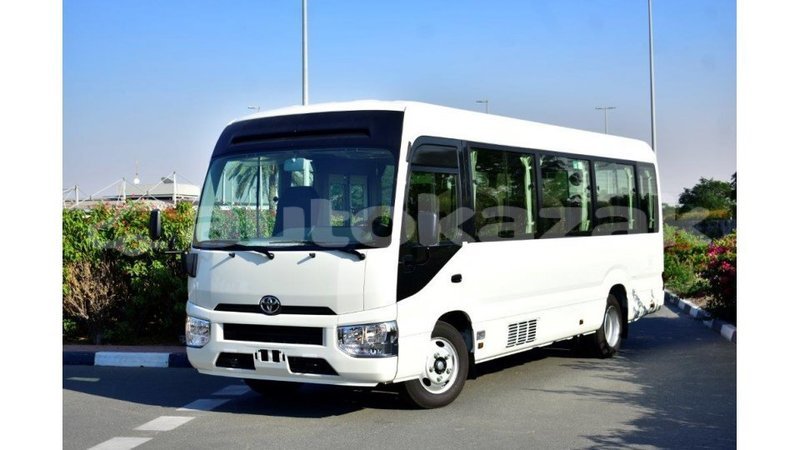 Big with watermark toyota coaster akmecet import dubai 1955