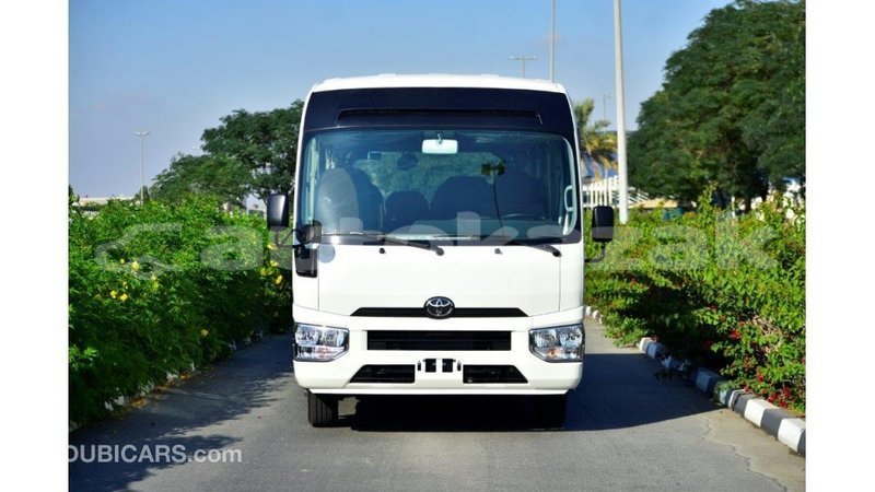 Big with watermark toyota coaster akmecet import dubai 1955