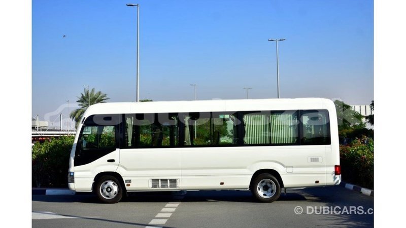 Big with watermark toyota coaster akmecet import dubai 1955