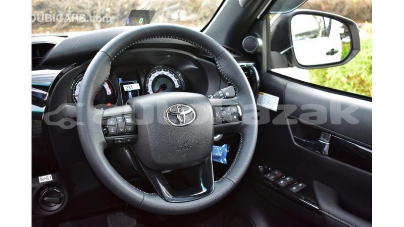 Big with watermark toyota hilux akmecet import dubai 1961