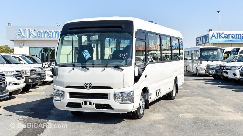 Big with watermark toyota coaster akmecet import dubai 2088