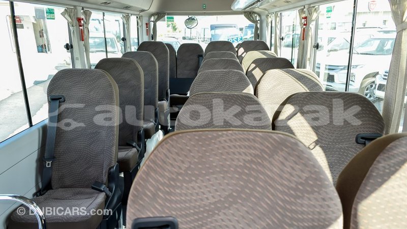 Big with watermark toyota coaster akmecet import dubai 2088