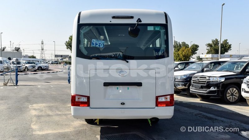 Big with watermark toyota coaster akmecet import dubai 2088