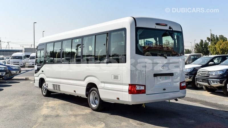 Big with watermark toyota coaster akmecet import dubai 2088