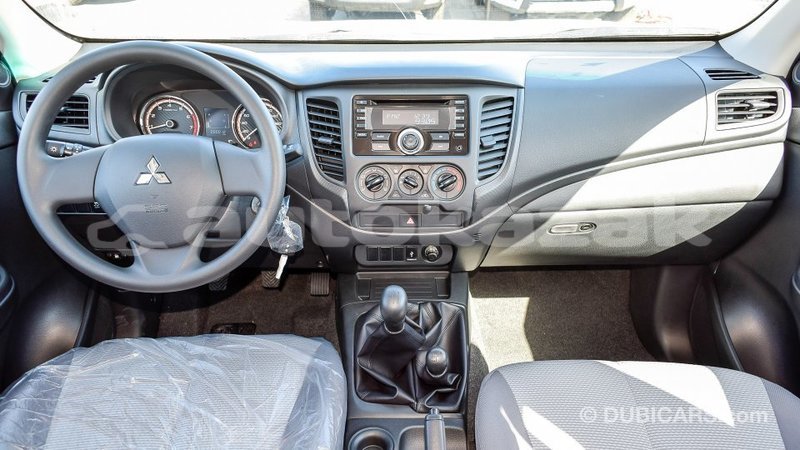 Big with watermark mitsubishi l200 akmecet import dubai 2091