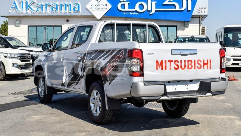 Big with watermark mitsubishi l200 akmecet import dubai 2091