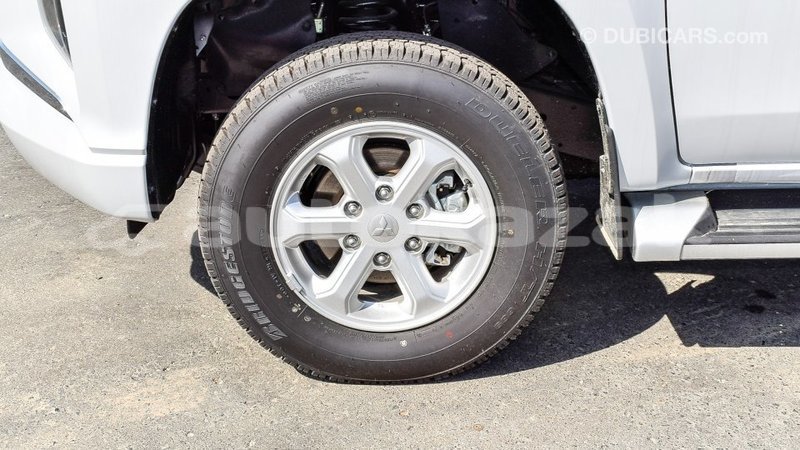 Big with watermark mitsubishi l200 akmecet import dubai 2095