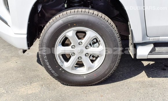 Buy Import Mitsubishi L200 White Car in Import - Dubai in Akmecet Buy Import Mitsubishi L200 White Car in Import - Dubai in Akmecet