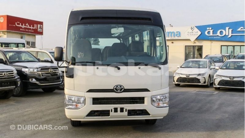 Big with watermark toyota coaster akmecet import dubai 2290