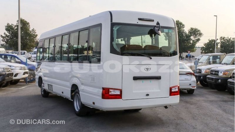 Big with watermark toyota coaster akmecet import dubai 2290