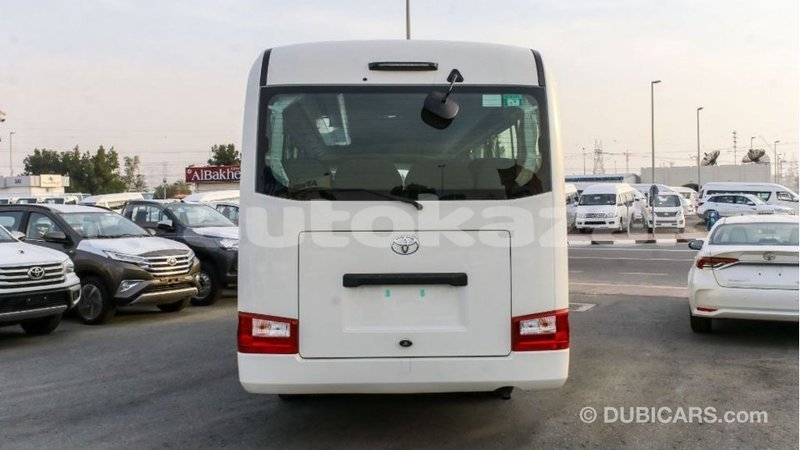 Big with watermark toyota coaster akmecet import dubai 2290