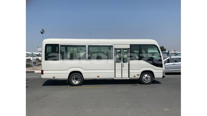 Big with watermark toyota coaster akmecet import dubai 2982