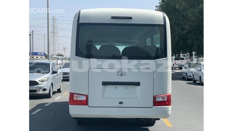 Big with watermark toyota coaster akmecet import dubai 2982