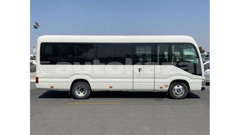 Big with watermark toyota coaster akmecet import dubai 2984