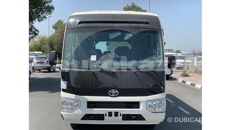 Big with watermark toyota coaster akmecet import dubai 2984