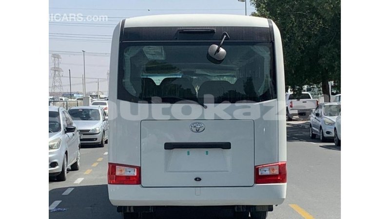 Big with watermark toyota coaster akmecet import dubai 2984