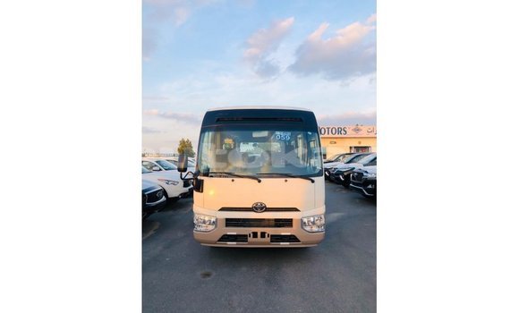 Buy Import Toyota Coaster White Car in Import - Dubai in Akmecet