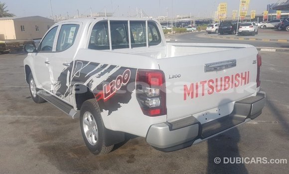 Buy Import Mitsubishi L200 White Car in Import - Dubai in Akmecet Buy Import Mitsubishi L200 White Car in Import - Dubai in Akmecet