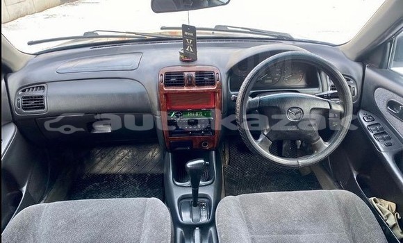 Buy Used Mazda Capella Black Car in Aktau in Mankistau Buy Used Mazda Capella Black Car in Aktau in Mankistau